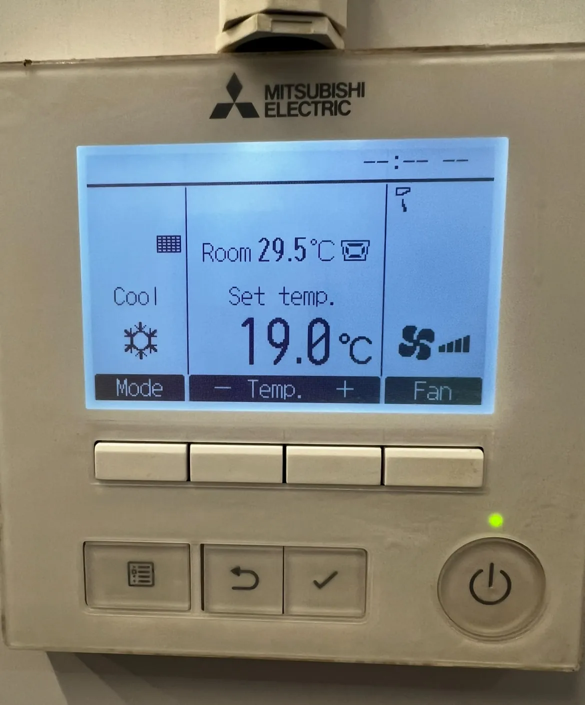 A Mitsubishi Electric wall controller showing a cooling set point